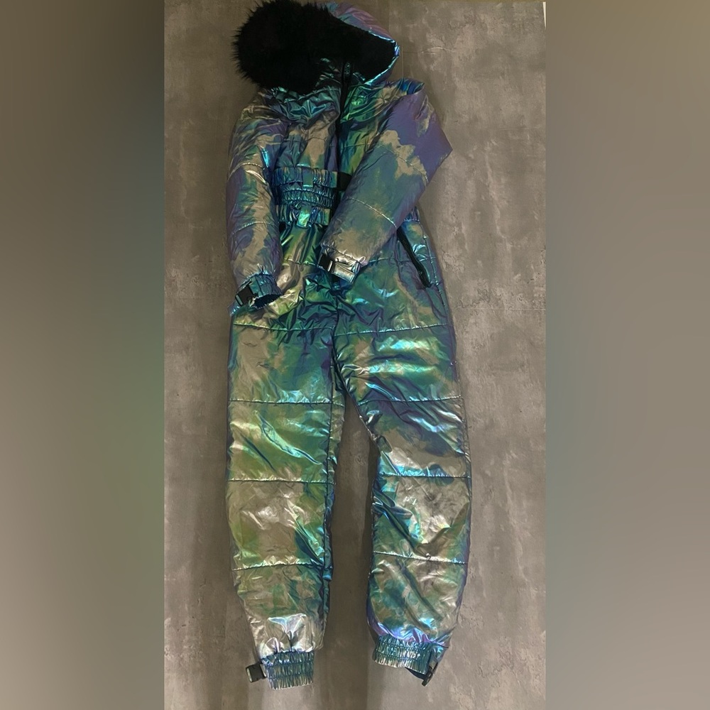 Women’s holographic snow suit by Dolls Kill Club EXX